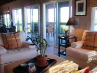 thumb_3403_livingareawithviewtoenclosedporch.jpg