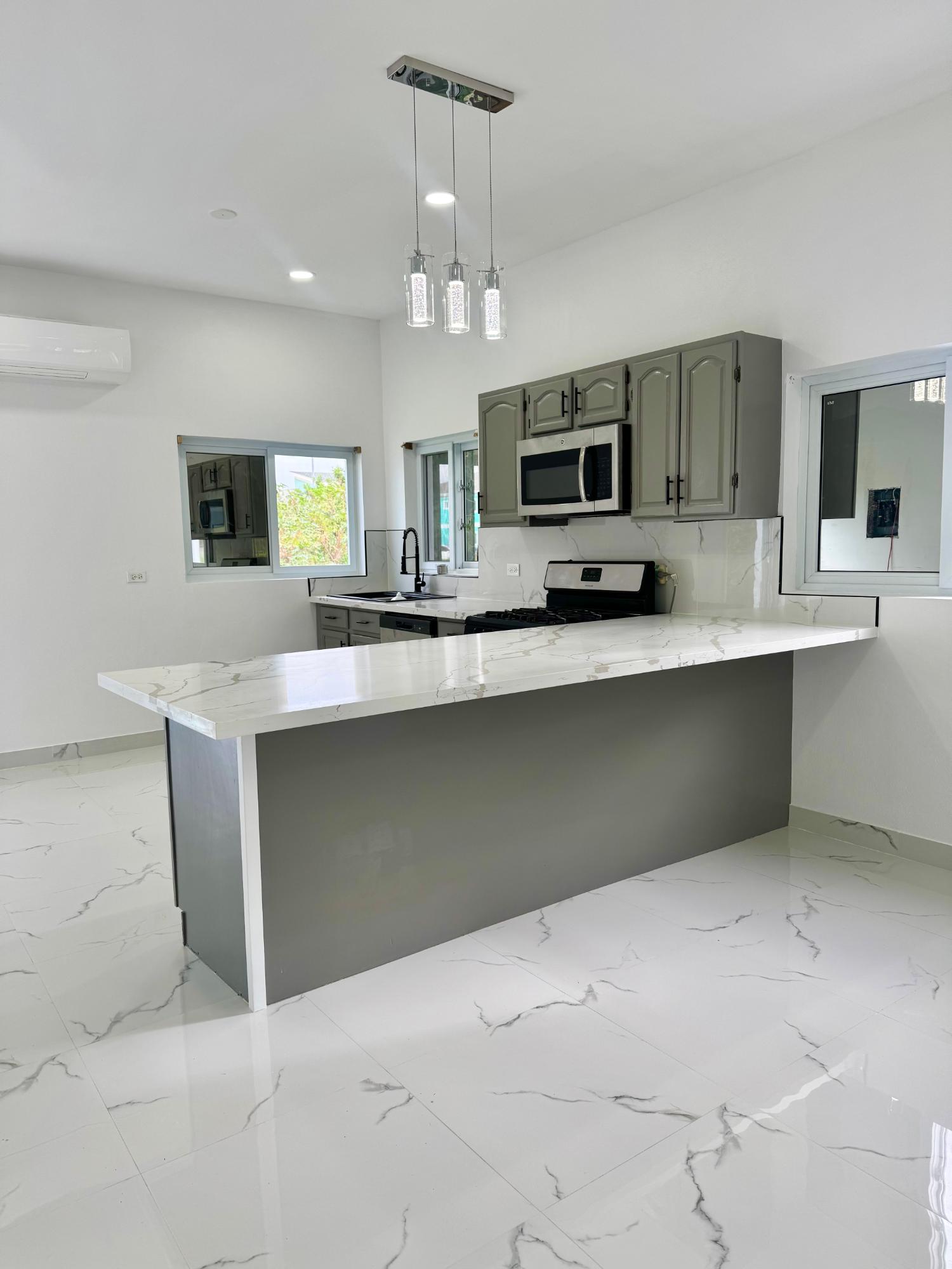 /listing-half-duplex-in-west-bay-street-76207.html from Coldwell Banker Bahamas Real Estate